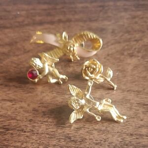 Gold-Toned Angel Wing Brooch with Red Gem Accent